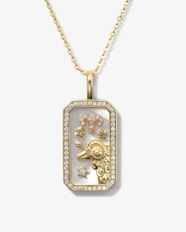 Gold necklace with a rectangular pendant featuring a lion design on a white background