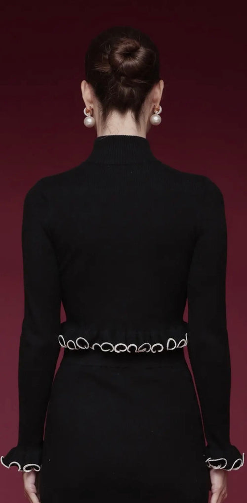 Lacey Ruffle Turtleneck Sweater in black