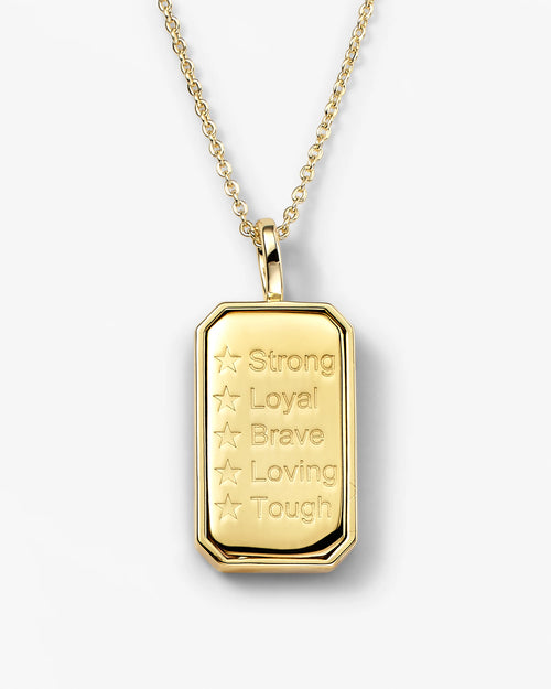 Gold pendant necklace with engraved text on a white background